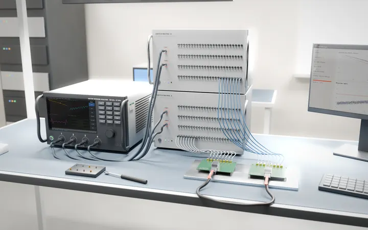 Telvonic cable test system on an ESD bench: 4-port vector network analyzer cabled to two stacked 96-port switch-matrix units, which connect every pair of a DAC cable on its test fixture, with the automation software on a monitor